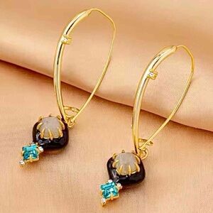 Alexis Bittar Gold and Black Hoop Earrings